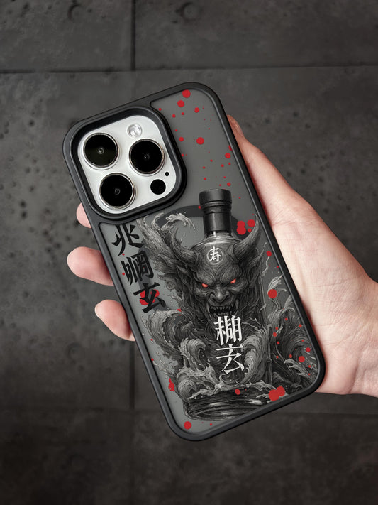 A hand holding a phone case with a design featuring a devil-like creature and Japanese text.