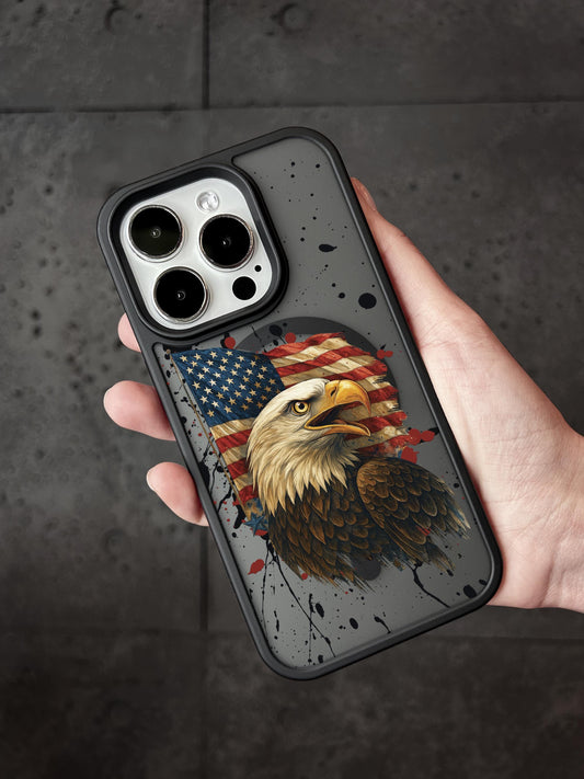A person&#39;s hand holding a phone case with an image of an eagle and an American flag printed on it.