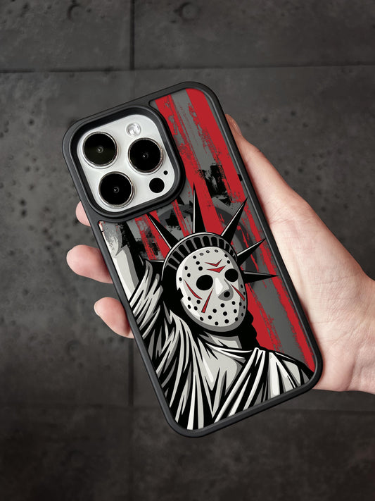 A hand holding a phone case featuring a graphic design of the Statue of Liberty with a mask on it.
