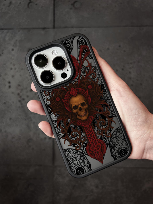 a person holding a phone case with a skull on it