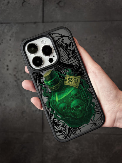 a person holding an iphone case with a green bear on it