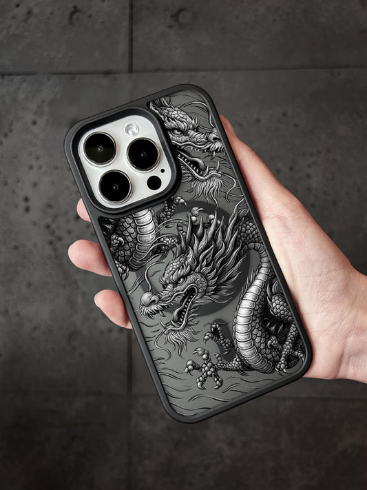 a person holding a phone case with a dragon on it