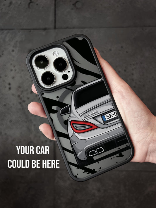 a person holding a phone case with a car on it