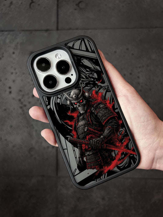 a person holding a black and red phone case