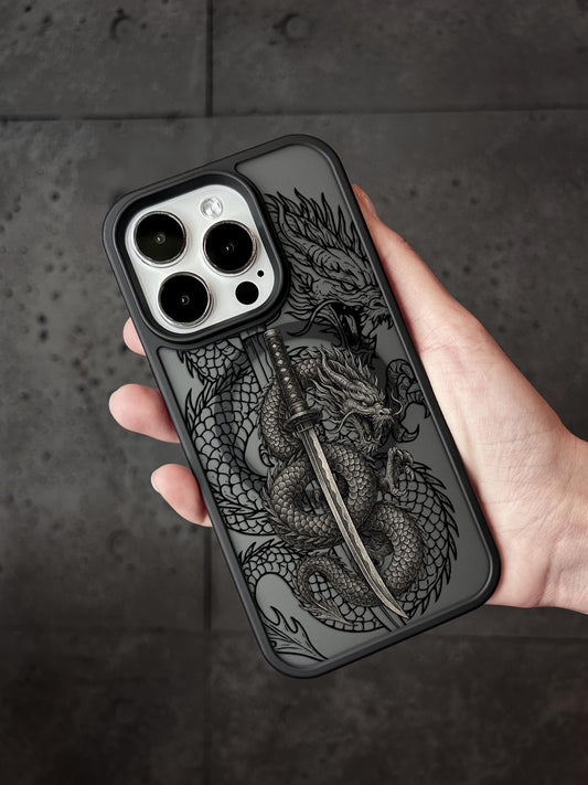 a person holding a phone case with a dragon on it