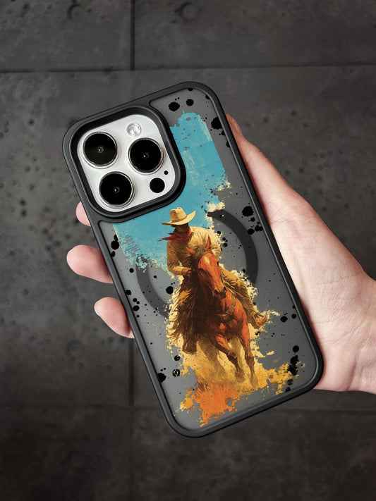 A hand holding a phone case with a cowboy riding a horse printed on it.