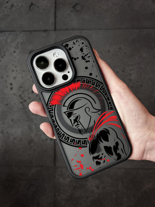a hand holding a black and red phone case