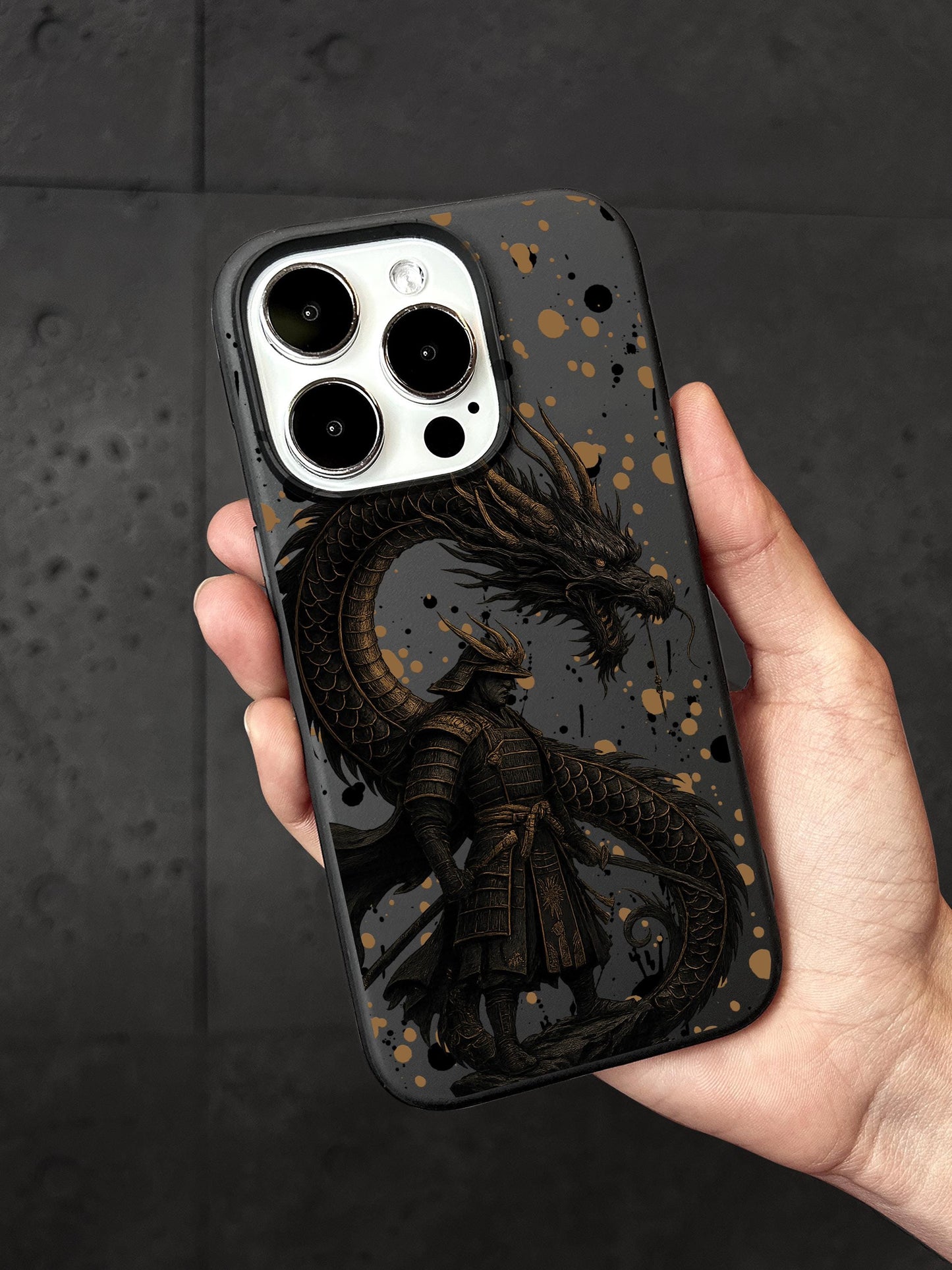 a person holding a phone case with a dragon on it